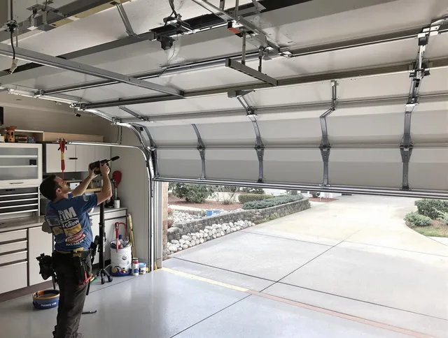 Garage door track repair service by Lawndale Garage Door Repair in Lawndale